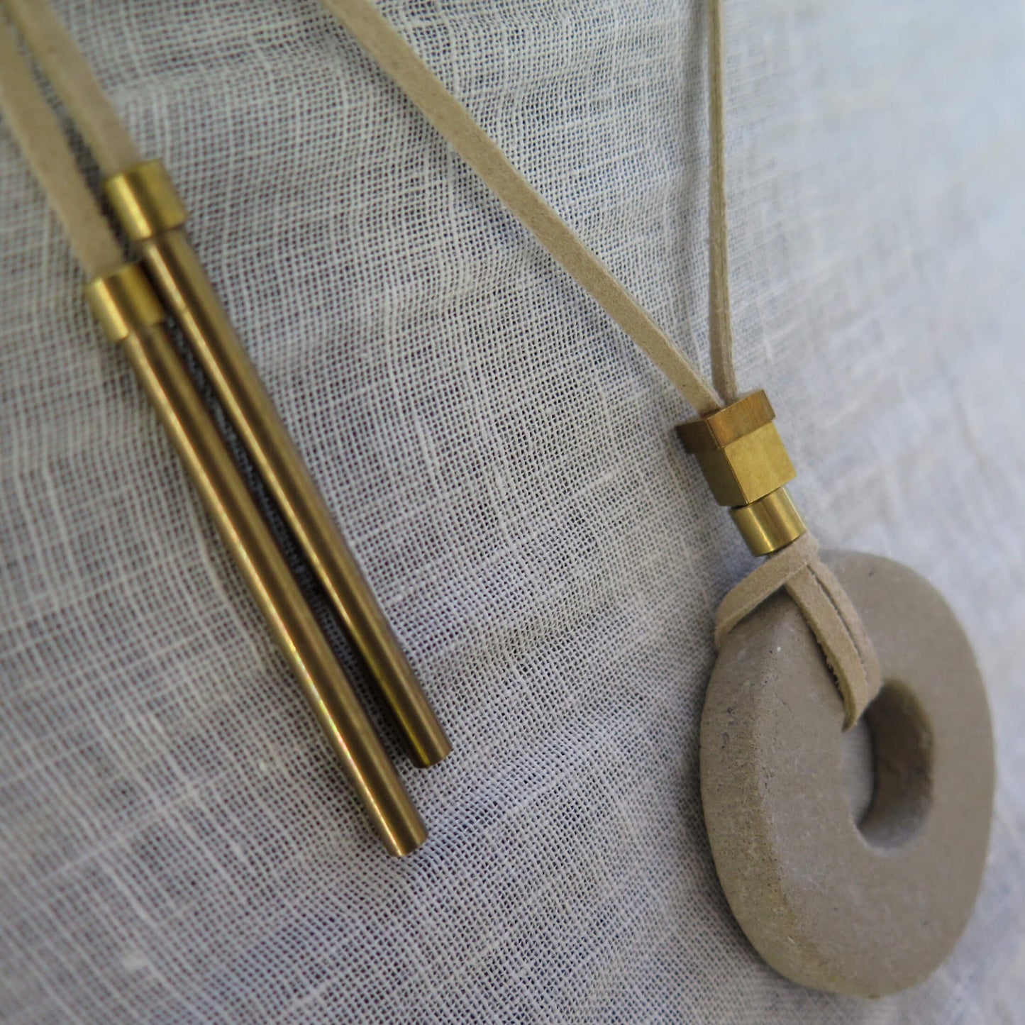 Concrete pendant on vegan suede with antique bronze and raw brass #2