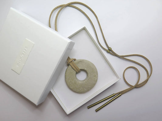 White gift box with handmade clay label